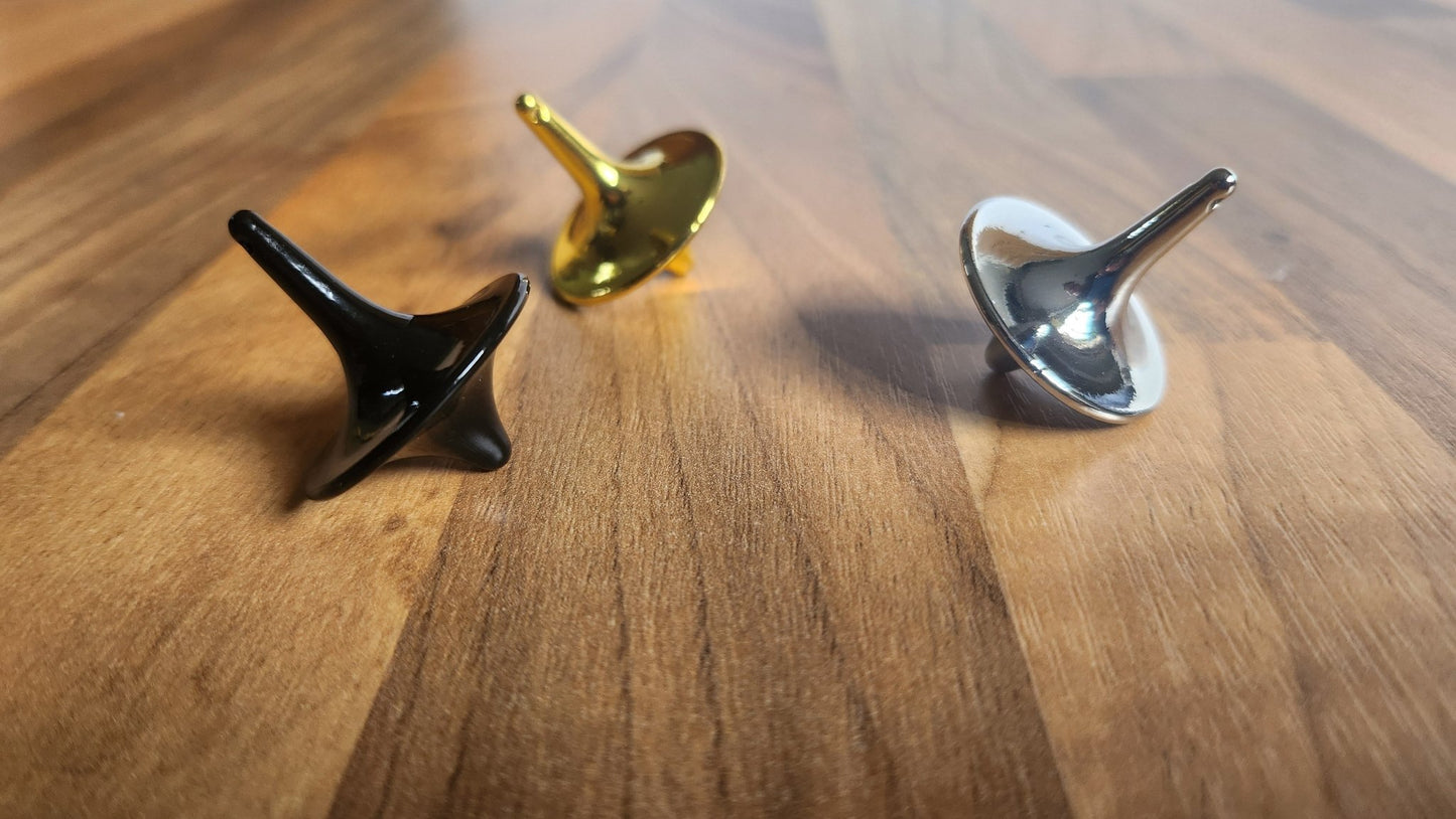 Spinning tops - Holey Coley